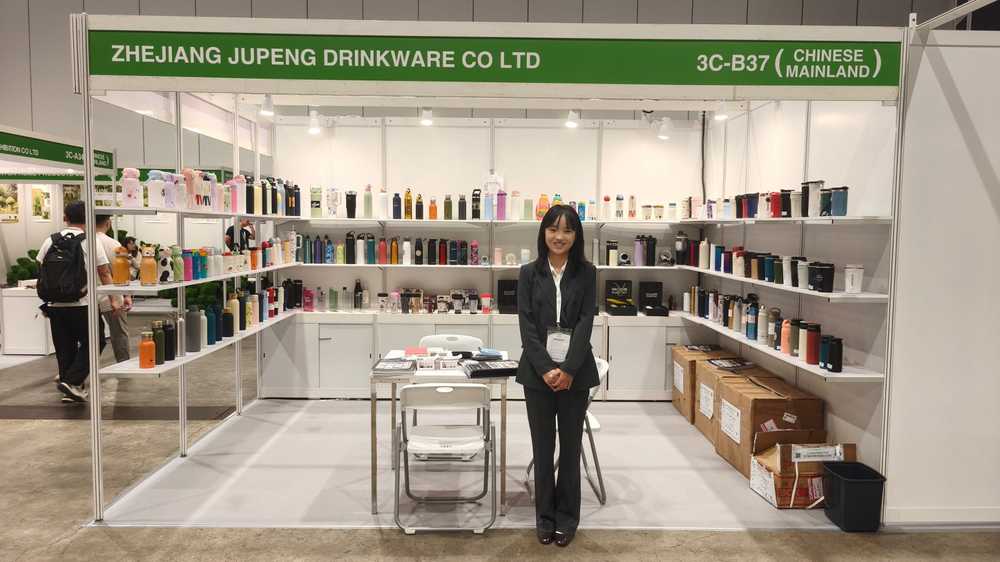 Stainless steel thermos, sport bottle, coffee mug and shaker display racks at Booth 3C-B37