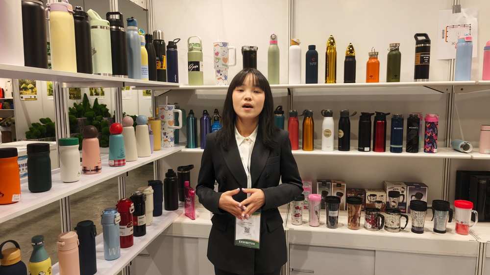 Sales team presenting new 2026 insulated bottle and tumbler samples