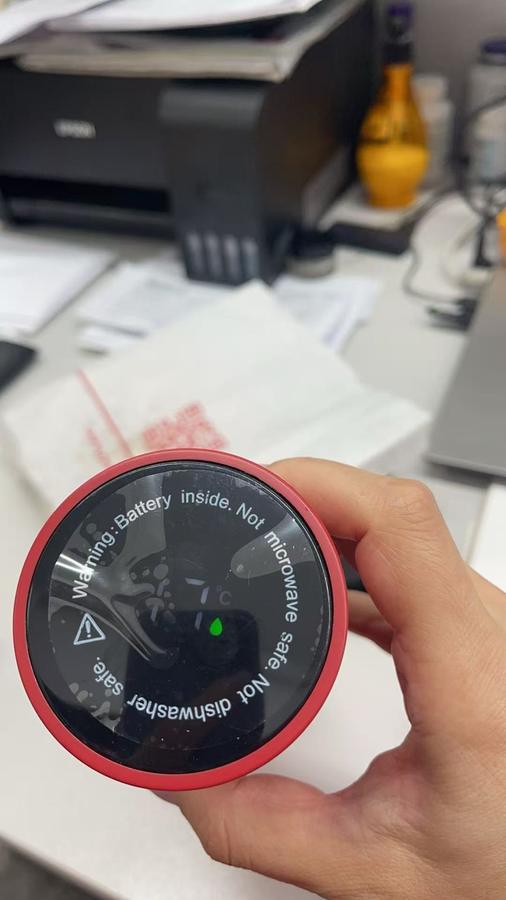 Smart LED touch temperature-display lid demonstrated on physical sample at MEGA SHOW 2026