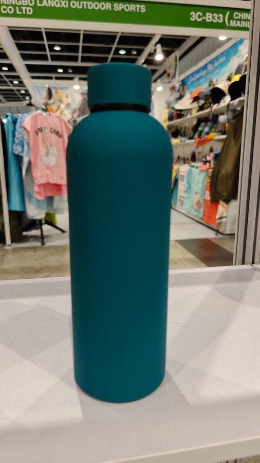Lid and spout detail on matte teal sport vacuum bottle