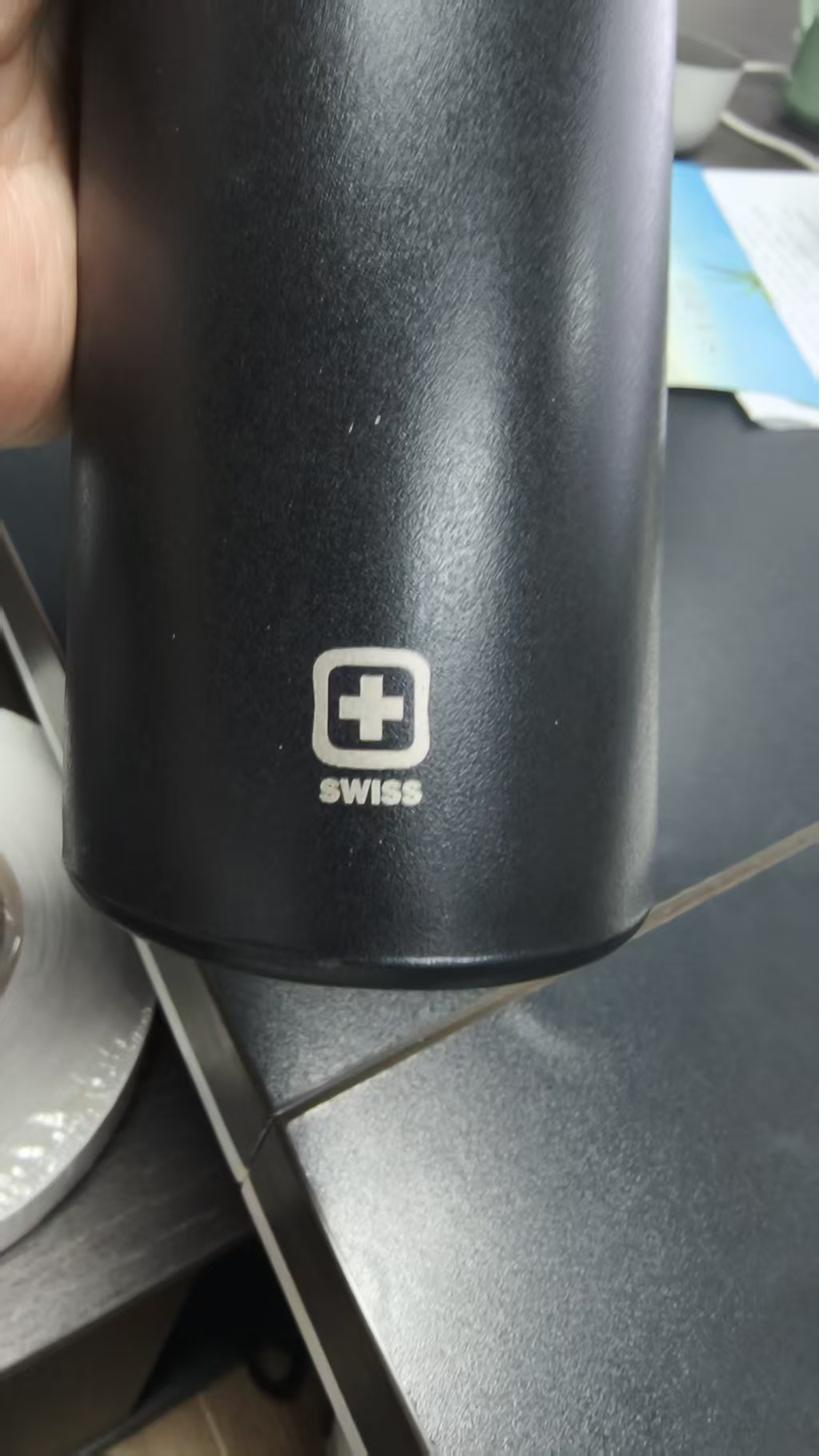 Custom logo laser engraving on stainless steel