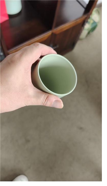 Green ceramic-lined thermos cup interior
